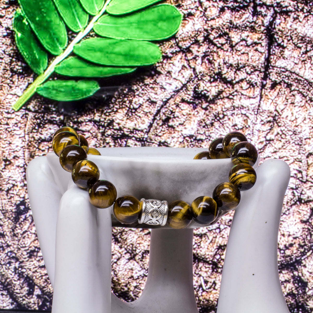 The Abundance Bracelet (10mm) - Tigers Eye is a crystal with beautiful bands of yellow-golden-brown colour running through it. This is a powerful stone that can help you to release anxiety and nervousness and assists in harmony and equilibrium. It is a powerful motivator and one of the best stones for financial success.