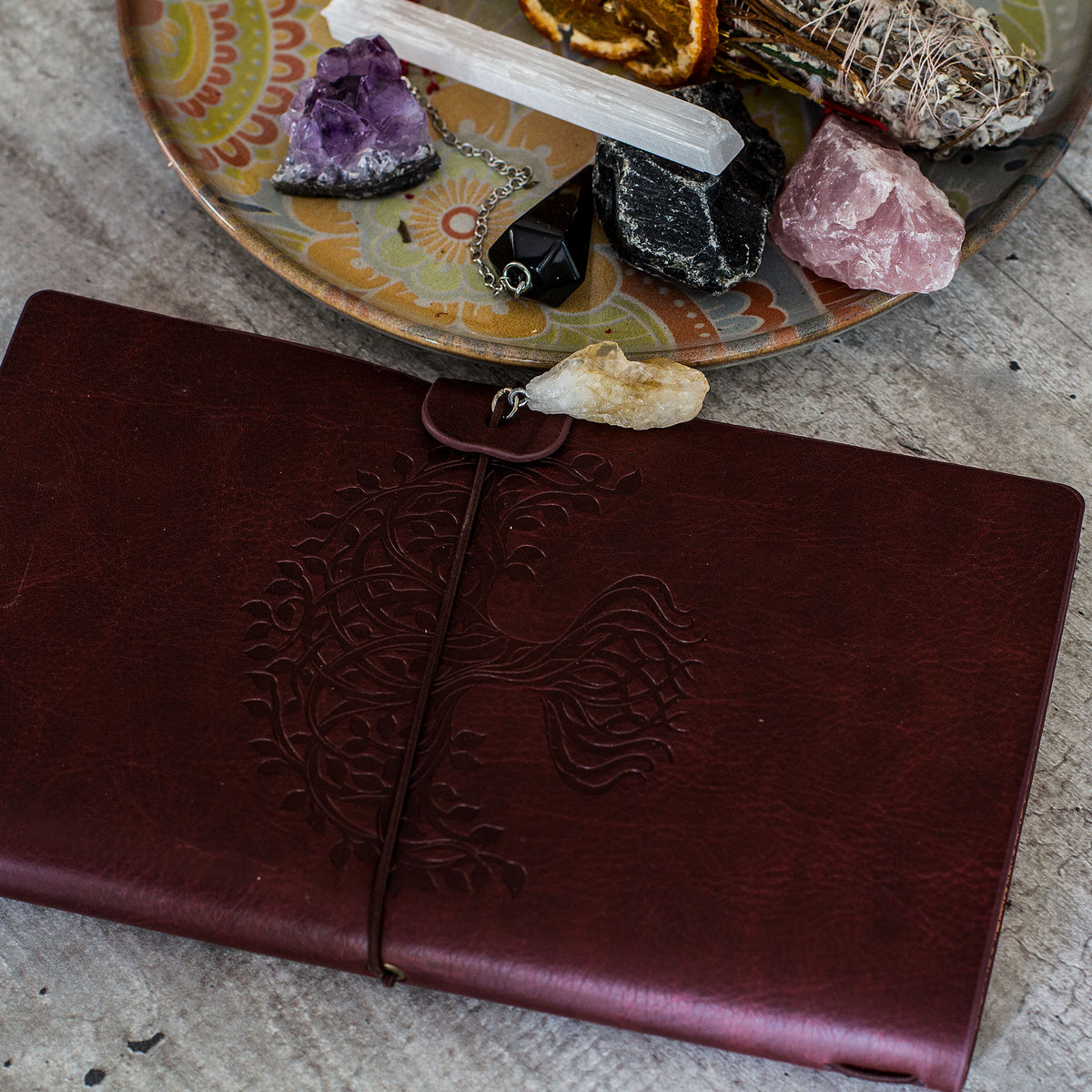 Manifestation Journal - Tree of Life (Red Leather) - Capture your thoughts and ambitions in this elegant leather journal complete with an elastic band and a hanging crystal to manifest your ideal life.