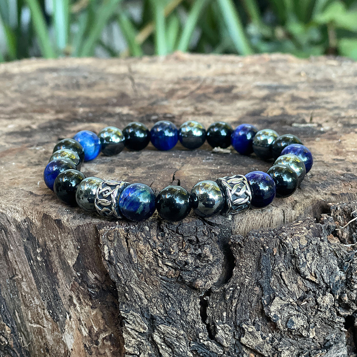 The Triple Protection bracelet 10mm - 3 of the most powerful crystals combined to create perfection. The Triple Protection Bracelet is one of our most sought after bracelets, boasting some of the most incredible gems around. Blue Tiger’s eye, black Obsidian and Hematite is the powerhouse of beads when combined into one.