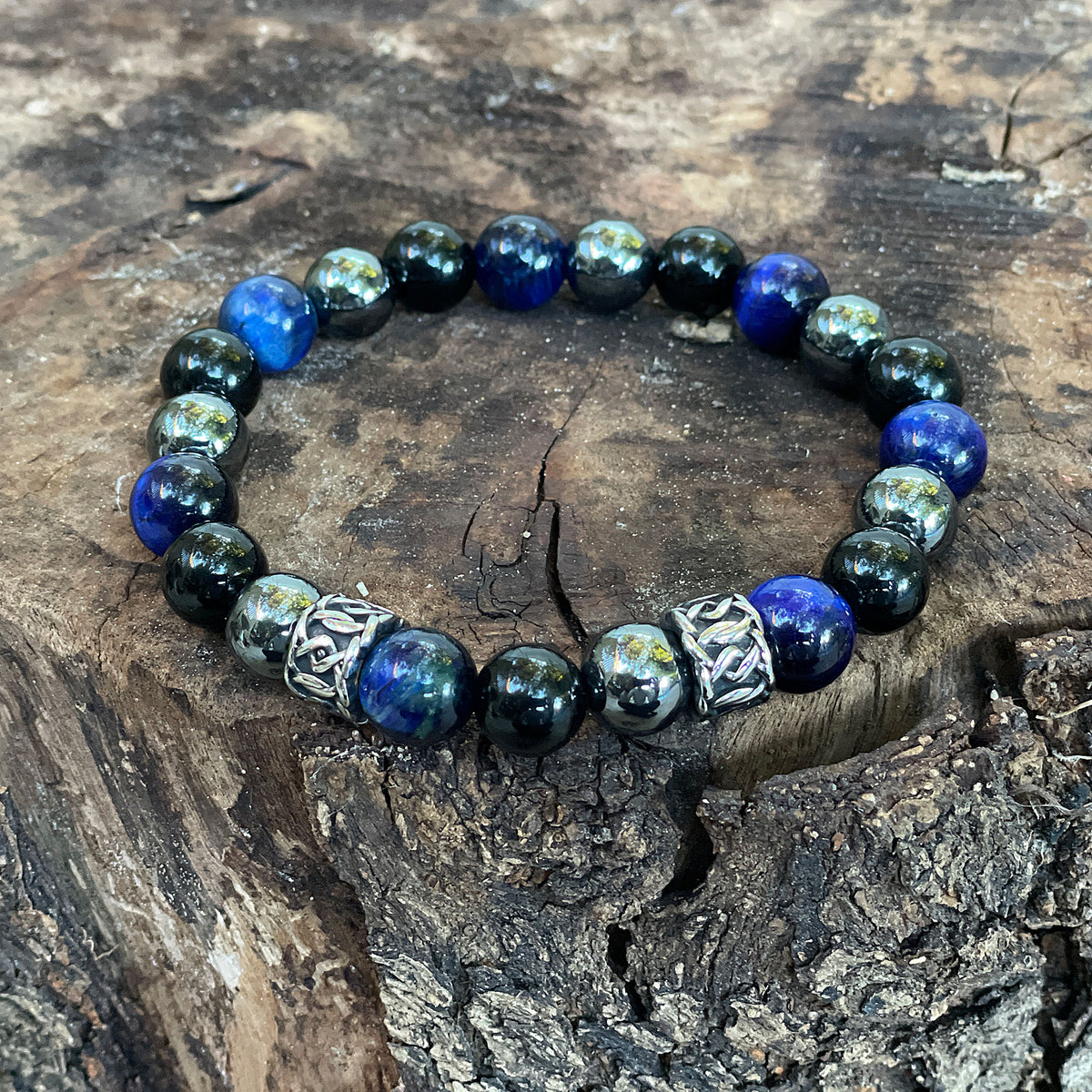 The Triple Protection bracelet 10mm - 3 of the most powerful crystals combined to create perfection. The Triple Protection Bracelet is one of our most sought after bracelets, boasting some of the most incredible gems around. Blue Tiger’s eye, black Obsidian and Hematite is the powerhouse of beads when combined into one.
